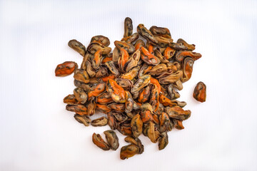 Mussels Pile Isolated on white background, Deshelled Clam, Peeled Mussel, Open Shellfish Seafood, Mussels Meat, Cooked Shellfish on Top View