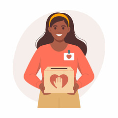 A cheerful woman promotes charity work while holding a donation box, symbolizing kindness and community engagement in a warm and friendly atmosphere.