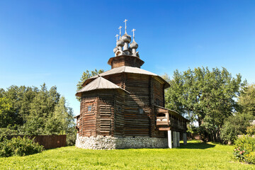 wooden Church of the Cathedral of the Blessed Virgin Mary from the village of Holm, 1552, in the Museum of wooden architecture Kostroma Sloboda. Kostroma, Russia, golden ring