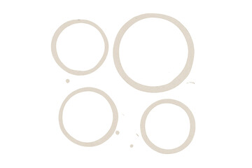 Circular marks and liquid spots from coffee cups and beverage stains create a spilled effect on a clear background
