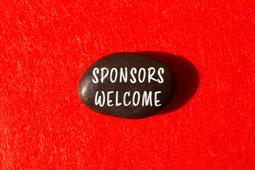 Sponsors welcome message written on stone background. Conceptual Sponsors welcome symbol. Copy space.