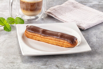 Gourmet chocolate eclair with icing