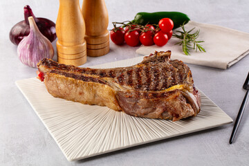 Grilled ribeye beef steak with bone