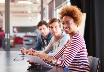 Creative, woman and meeting with paperwork in office for story ideas, article briefing or review....