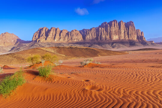 Wadi Rum Desert, Jordan. The red desert and Jabal Al Qattar mountain.