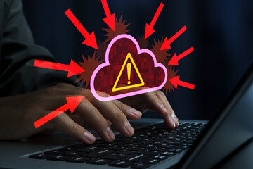 Cyber attacks on cloud servers. DDoS attack and cloud service disruption. Hacker using laptop computer.