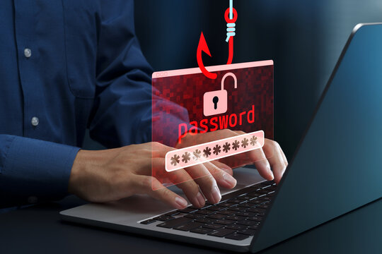 Spear phishing and whaling attack. Theft of password and identity. Spoofing and fraudulent messages. Businessperson using laptop computer.