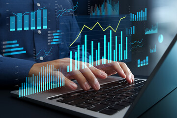 Data analysis. Visualization of business intelligence. KPIs graphs and statistical reports. Businessperson using laptop computer to look at analytics dashboard.