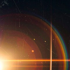 Vibrant lens flare with dust and scratches on a dark background, creating a cinematic and dramatic effect.