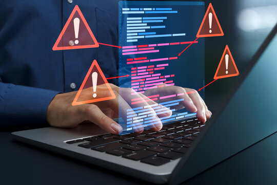 Bugs in software source code and debugging. Programmer using laptop computer to fix bugs.