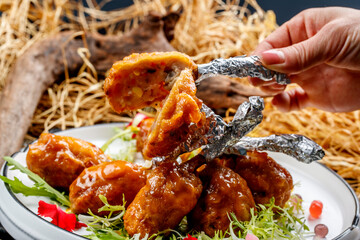 Molecular vegetable chicken wings and fried assorted vegetables