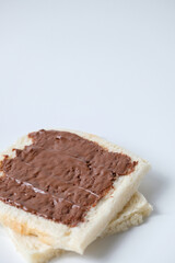 Close-up of white bread with chocolate jam