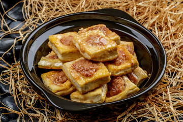 Casserole with Five-Spice Pork Filling and Stuffed Tofu