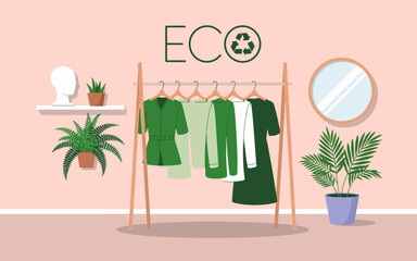 This stylish display features eco-friendly clothing arranged elegantly in a chic, minimalist setting, surrounded by plants that emphasize sustainability and environmental responsibility.