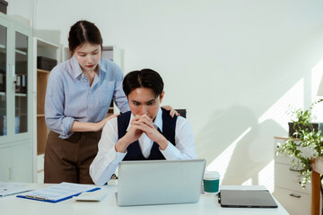 business people, teamwork, people and crisis concept - business team sitting sad and solving problems in the office.