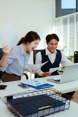 Happy smiling businessman feel happy work complete Teamwork success, success at work in the office concept.