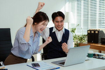 Happy smiling businessman feel happy work complete Teamwork success, success at work in the office concept.