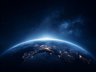 Earth view from space showing city lights and a blue atmosphere with a starry background view.
