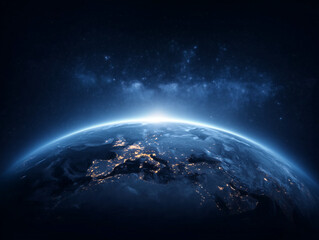 A view of earth from space with city lights and a glowing atmosphere on the horizon line view.