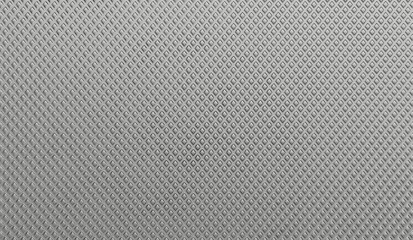 3d render of a knurled metal surface texture. industrial grey steel background pattern for grip and heavy duty applications.