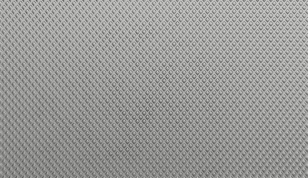 3d render of a knurled metal surface texture. industrial grey steel background pattern for grip and heavy duty applications.
