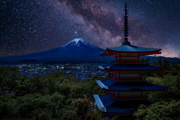 Chureito Pagoda under a star-filled night sky with the majestic silhouette of Mount Fuji in the background, Arakurayama Sengen Park, Japan