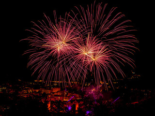 Vibrant pink and purple fireworks for New Year Eve party