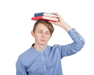 Exhausted teenage guy keeps books on his head has to prepare for exams and feeling overwhelmed, depressed. Concept of difficult education