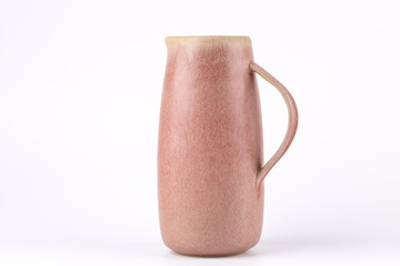 Front view of a pink ceramic vase on white background, minimalist and clean composition with copy space. Concept of modern home decor and elegant lifestyle