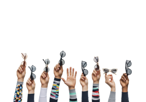 Diverse hands, unique patterned socks, stylish sunglasses, rising against a transparent studio background with copy space. Concept of collaborative innovation