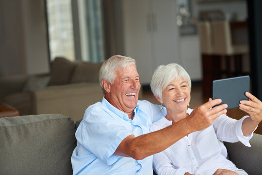 Video call, happy and senior couple on tablet for online conversation, chatting and talking. Home, retirement and elderly man and woman on tech with laugh, social networking and contact connection