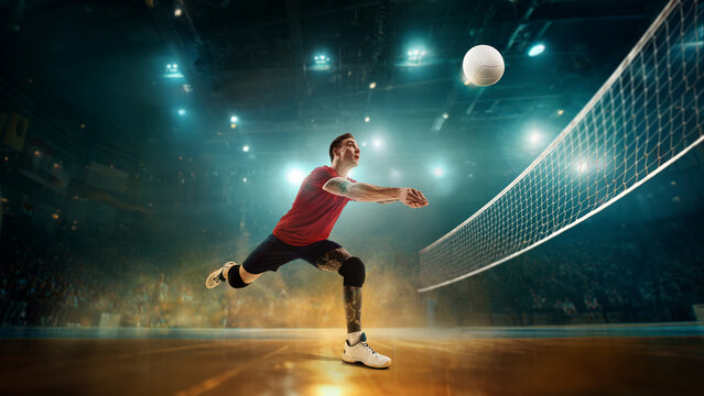 Trendy collage of male volleyball player diving horizontally to save ball under vivid arena lights. Concept of dramatic sports visuals, athlete storytelling, and training content. - Powered by Adobe
