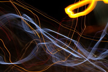 Vibrant Weave of Light Trails: Long Exposure Night Abstract