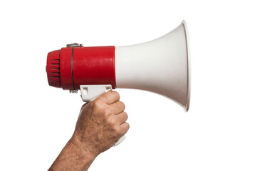 Hand holding red and white megaphone against white background, person grips loudspeaker to announce message for protest, safety alert, event promotion or public communication concept