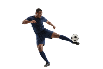 Soccer player kicking ball in mid air on isolated background, athletic action and competitive sports training concept for fitness, agility and team game promotion