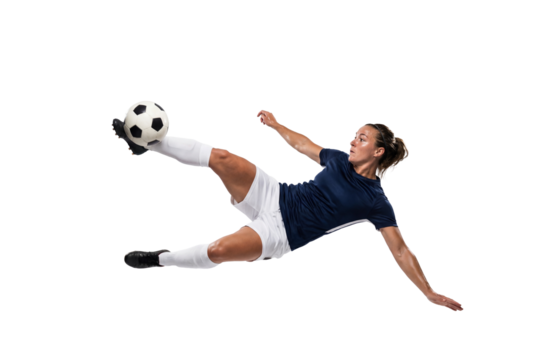 Female soccer player performing airborne bicycle kick on isolated black background, athletic action and competitive sports concept for training, fitness motivation and team game promotion - Powered by Adobe