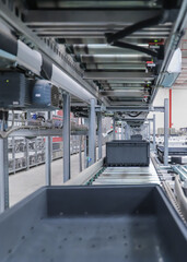 packing line in a logistics warehouse. conveyor belt in a modern production line