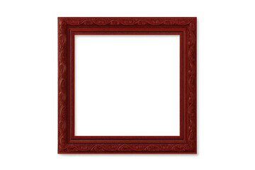 Fototapeta premium Ornate antique red wooden picture frame with detailed carvings, empty square border, transparent background for design