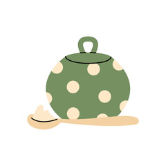 Cute green sugar bowl with polka dots, loose sugar and small spoon for warm tea moments