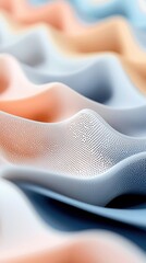 An abstract image featuring a wavy surface with a perforated texture and a gradient of colors, creating a sense of depth and visual interest.
