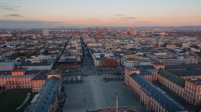 Mannheim Palace Sunset View: Stunning Aerial of Historic Baroque Castle and Courtyard during Golden Hour, Warm Light on University Facade, Germany