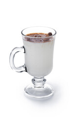 Eggnog with Cinnamon in glass isolated on white background. Christmas drink	