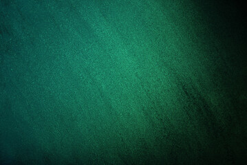 Glossy green texture or background with space for text. Vertical design template.