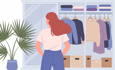 A woman standing in front of a well-organized wardrobe filled with clothing, conveying themes of fashion, choice, and everyday life, inviting viewers to relate and reflect.