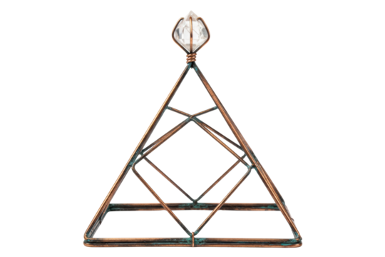 Copper wire meditation pyramid with quartz crystal point on isolated background