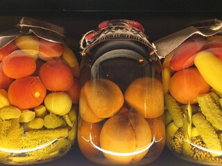 Assorted Pickled Vegetables and Fruits in Glass Jars