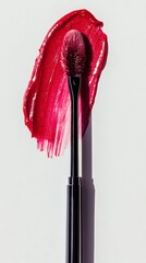 Red Lip Gloss Swatch with Brush on White Backdrop, Makeup Beauty Still Life