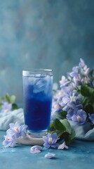 Refreshing Blue Butterfly Pea Tea with Ice and Delicate Floral Garnish