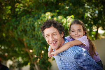 Fototapeta premium Dad, girl and piggyback with smile outdoor, portrait and bonding in backyard with love at family house. People, father and child with fun, games and playful in summer, garden and connection in Italy