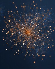 Obraz premium A bright, glowing sparkler emitting golden sparks against a dark background.
